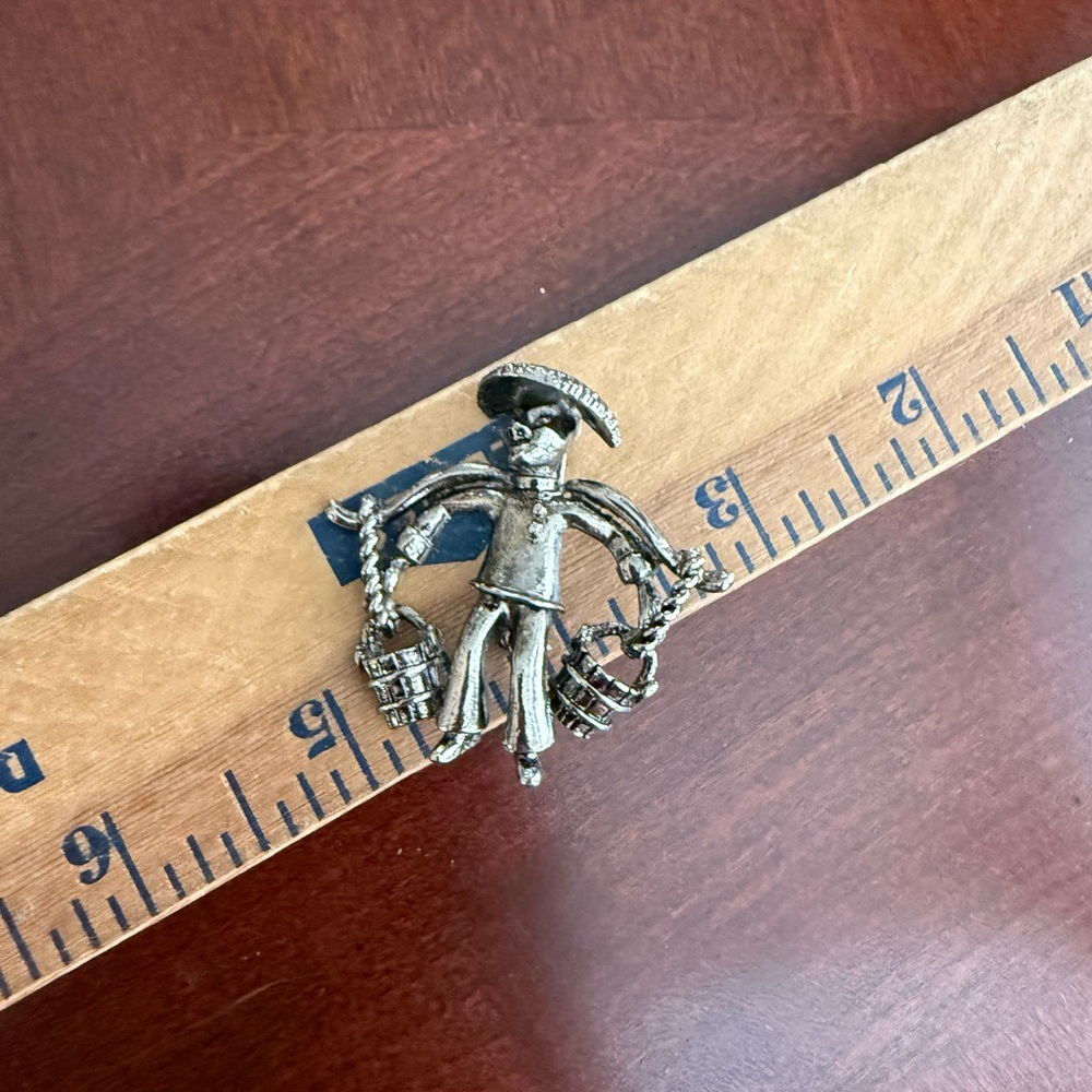 Vintage Man Carrying Water Brooch